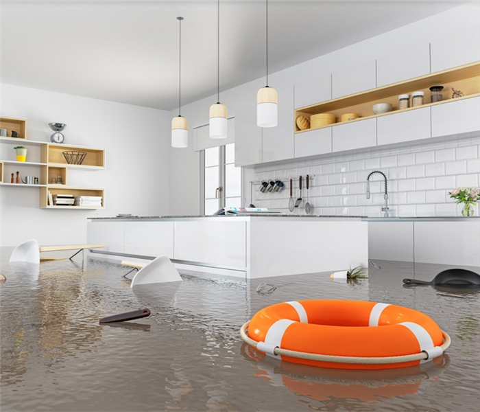 flooded kitchen with chairs floating